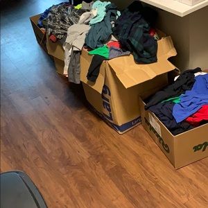 Tons of clothes for sale come by to take a look